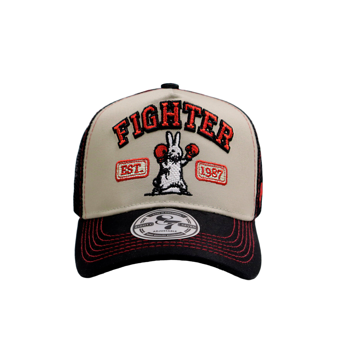 GORRA TRUCKER AJUSTABLE BEIGE CON NEGRO RABBIT FIGHTER